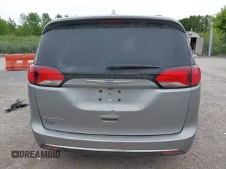 2020 Chrysler Pacifica Touring L with VIN 2C4RC1BG2LR127986, listed as a IAAI auction lot 42419518 with 107,618 mi miles and . Bid and sale history available at DreamBid. Image 16.