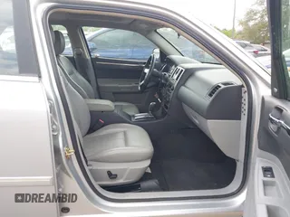 2006 Chrysler 300 Touring with VIN 2C3KA53GX6H113815, listed as a IAAI auction lot 42149912 with 144,813 mi miles. Bid and sale history available at carsss.com. Image 5.