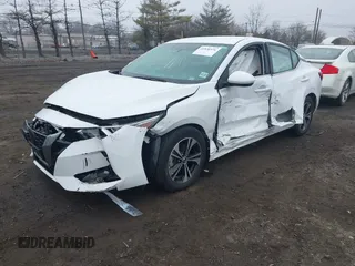 2022 Nissan Sentra SV z VIN 3N1AB8CV3NY307506, wystawiony jako IAAI lot #41830376 z przebiegiem 6 899 mil mil oraz . Historia ofert i sprzedaży dostępna na DreamBid. Obrazek 17.
