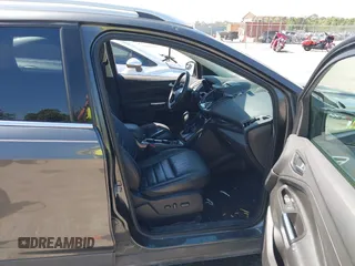 2016 Ford Escape Titanium with VIN 1FMCU0J95GUB11995, listed as a IAAI auction lot 42065255 with 142,390 mi miles. Bid and sale history available at carsss.com. Image 5.