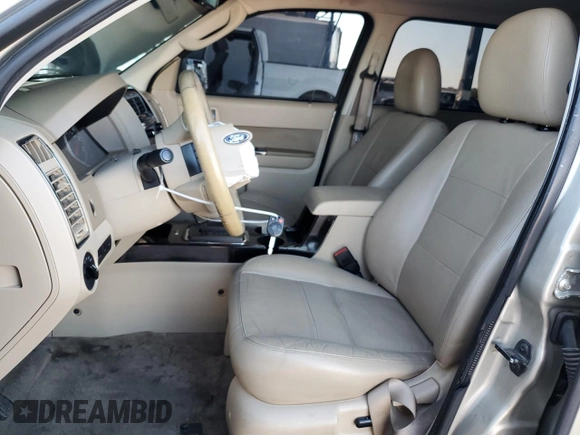 2010 Ford Escape Limited with VIN 1FMCU9EG9AKB92211, listed as a Copart auction lot 64062905 with 180,721 mi miles and Salvage title. Bid and sale history available at DreamBid. Image 7.