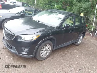 2013 Mazda CX-5 Sport with VIN JM3KE2BE8D0125002, listed as a IAAI auction lot 42425404 with 183,551 mi miles and . Bid and sale history available at DreamBid. Image 2.