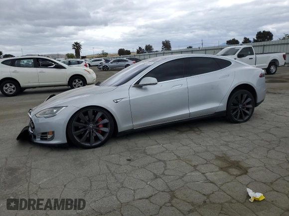 2014 Tesla Model S 60 z VIN 5YJSA1H11EFP43395, wystawiony jako Copart lot #54653845 z przebiegiem 120 180 mil mil oraz Szkoda całkowita • Salvage title. Historia ofert i sprzedaży dostępna na DreamBid. Obrazek 1.