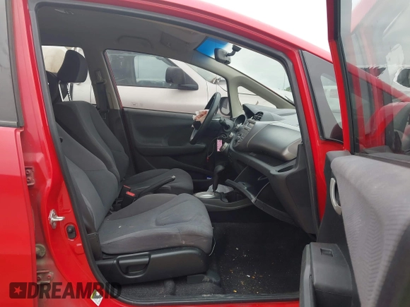 2013 Honda Fit with VIN JHMGE8H39DC065770, listed as a IAAI auction lot 42024432 with 67,267 mi miles. Bid and sale history available at carsss.com. Image 5.
