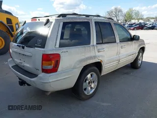 2001 Jeep Grand Cherokee Limited with VIN 1J4GW58NX1C545871, listed as a IAAI auction lot 42009766 with 191,570 mi miles and . Bid and sale history available at DreamBid. Image 4.