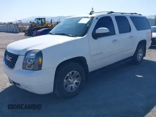 2007 GMC Yukon XL SLT with VIN 1GKFC16007R427817, listed as a IAAI auction lot 41836223 with 154,599 mi miles. Bid and sale history available at carsss.com. Image 2.