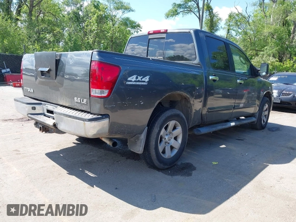2004 Nissan Titan LE with VIN 1N6AA07B04N525607, listed as a IAAI auction lot 42180184 with 267,589 mi miles. Bid and sale history available at carsss.com. Image 4.