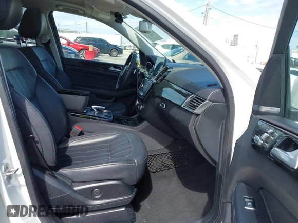 2018 Mercedes-Benz GLS 450 with VIN 4JGDF6EE9JB049030, listed as a IAAI auction lot 41804243 with 60,985 mi miles and . Bid and sale history available at DreamBid. Image 5.
