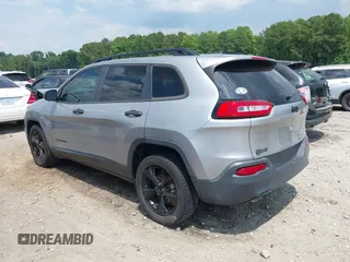 2016 Jeep Cherokee Altitude with VIN 1C4PJLAB7GW307900, listed as a IAAI auction lot 42611390 with 130,123 mi miles and . Bid and sale history available at DreamBid. Image 3.
