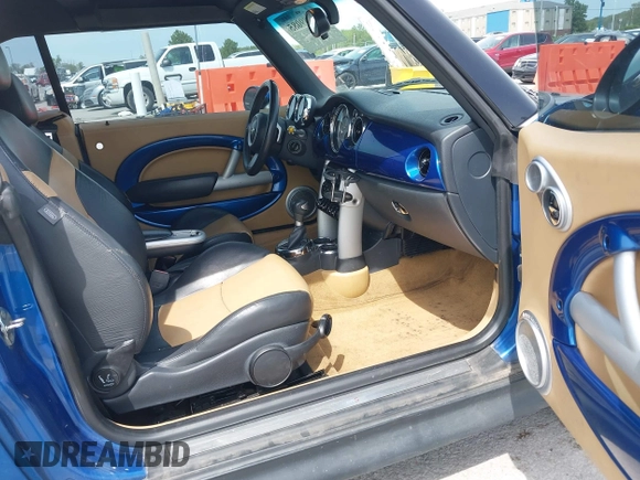 2006 MINI Convertible S with VIN WMWRH335X6TK59110, listed as a IAAI auction lot 42089085 with 101,303 mi miles and . Bid and sale history available at DreamBid. Image 5.