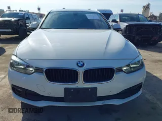 2016 BMW 3 Series 320i with VIN WBA8A9C59GK615704, listed as a IAAI auction lot 41431347 with 76,827 mi miles. Bid and sale history available at carsss.com. Image 12.