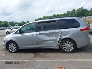 2013 Toyota Sienna XLE with VIN 5TDDK3DC3DS054803, listed as a IAAI auction lot 42389252 with 185,843 mi miles and . Bid and sale history available at DreamBid. Image 14.