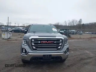 2021 GMC Sierra 1500 SLT z VIN 3GTU9DET8MG413416, wystawiony jako IAAI lot #41935465 z przebiegiem 70 547 mil mil oraz . Historia ofert i sprzedaży dostępna na DreamBid. Obrazek 12.