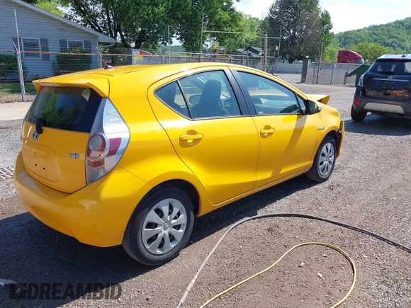 2014 Toyota Prius One z VIN JTDKDTB31E1066984, wystawiony jako IAAI lot #42261574 z przebiegiem 163 378 mil mil oraz . Historia ofert i sprzedaży dostępna na DreamBid. Obrazek 4.