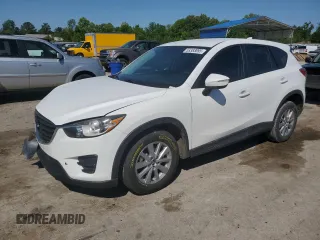 2016 Mazda CX-5 Sport с VIN JM3KE2BY3G0866933, выставлен на аукционе Copart как лот 53383095 с пробегом 111 822 миль миль и Списание • Salvage title. История ставок и продаж доступна на DreamBid. Изображение 1.
