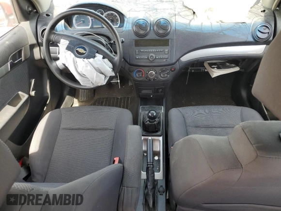 2009 Chevrolet Aveo 1LT z VIN KL1TD56E49B331612, wystawiony jako Copart lot #57293475 z przebiegiem Nie podano mil oraz Szkoda całkowita • Salvage title. Historia ofert i sprzedaży dostępna na DreamBid. Obrazek 8.
