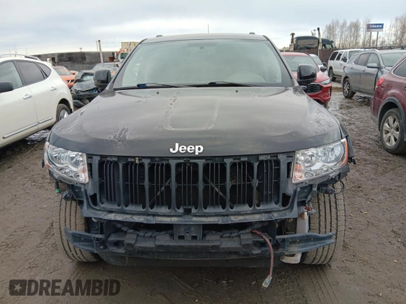 2011 Jeep Grand Cherokee Laredo z VIN 1J4RR4GG5BC508211, wystawiony jako Copart lot #53729935 z przebiegiem 124 408 mil mil oraz Szkoda całkowita • Salvage title. Historia ofert i sprzedaży dostępna na DreamBid. Obrazek 5.