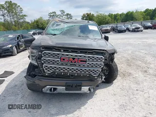 2019 GMC Sierra 1500 Denali z VIN 1GTU9FEL8KZ180128, wystawiony jako IAAI lot #42028488 z przebiegiem 78 015 mil mil oraz . Historia ofert i sprzedaży dostępna na DreamBid. Obrazek 12.