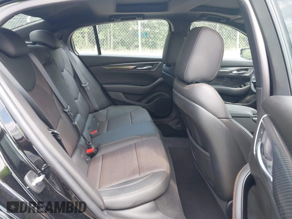 2024 Cadillac CT5 Sport z VIN 1G6DP5RK3R0127081, wystawiony jako IAAI lot #42319697 z przebiegiem 4 093 mil mil oraz . Historia ofert i sprzedaży dostępna na DreamBid. Obrazek 8.