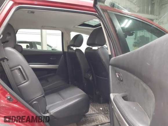 2015 Mazda CX-9 Grand Touring z VIN JM3TB3DAXF0464215, wystawiony jako IAAI lot #42043092 z przebiegiem 119 269 mil mil oraz . Historia ofert i sprzedaży dostępna na DreamBid. Obrazek 8.