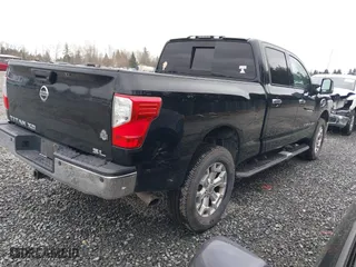 2016 Nissan Titan XD Platinum Reserve with VIN 1N6BA1F2XGN502660, listed as a IAAI auction lot 41731577 with 118,581 mi miles. Bid and sale history available at carsss.com. Image 4.