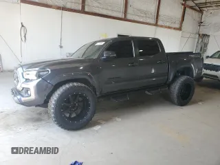 2019 Toyota Tacoma SR with VIN 3TMCZ5AN6KM238655, listed as a Copart auction lot 64716845 with 52,068 mi miles and Salvage title. Bid and sale history available at DreamBid. Image 1.