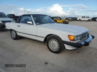 1989 Mercedes-Benz 560 SL with VIN WDBBA48DXKA096297, listed as a Copart auction lot 75597074 with 70,152 mi miles and Salvage Title. Bid and sale history available at DreamBid. Image 4.