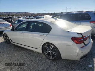 2019 BMW 7 Series 750i с VIN WBA7F0C53KGM25787, выставлен на аукционе Copart как лот 88172835 с пробегом 71 267 миль миль и Списание • Salvage title. История ставок и продаж доступна на DreamBid. Изображение 2.