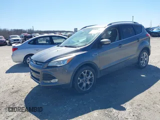 2014 Ford Escape Titanium with VIN 1FMCU9J93EUC72752, listed as a IAAI auction lot 41827668 with 91,194 mi miles and . Bid and sale history available at DreamBid. Image 2.