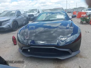 2020 Aston Martin Vantage z VIN SCFSMGAW4LGN03097, wystawiony jako IAAI lot #42227516 z przebiegiem Nie podano mil oraz . Historia ofert i sprzedaży dostępna na DreamBid. Obrazek 13.