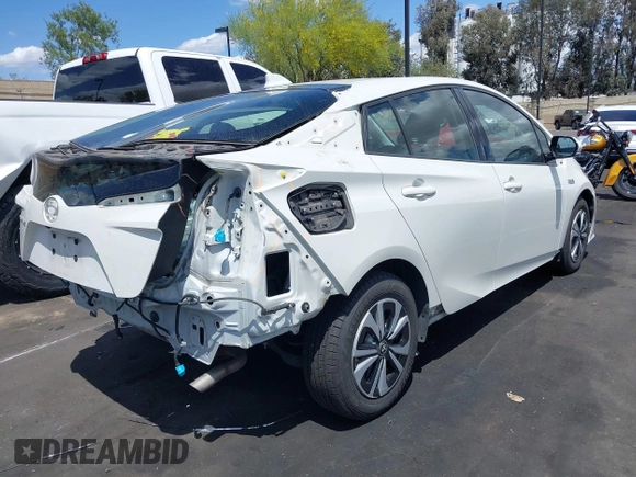 2017 Toyota Prius Plus with VIN JTDKARFP2H3019481, listed as a IAAI auction lot 42218637 with 77,795 mi miles and . Bid and sale history available at DreamBid. Image 4.