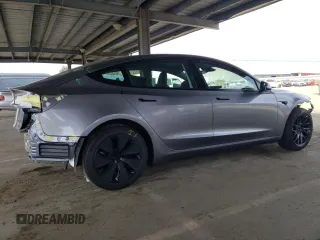 2025 Tesla Model 3 Long Range with VIN 5YJ3E1EA8SF880617, listed as a Copart auction lot 49484815 with 2,625 mi miles and Salvage Title. Bid and sale history available at DreamBid. Image 3.