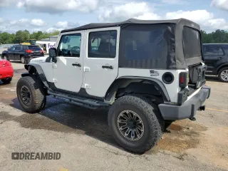 2010 Jeep Wrangler Unlimited Rubicon with VIN 1J4BA6H10AL176014, listed as a Copart auction lot 57092255 with 138,253 mi miles and Salvage title. Bid and sale history available at DreamBid. Image 2.
