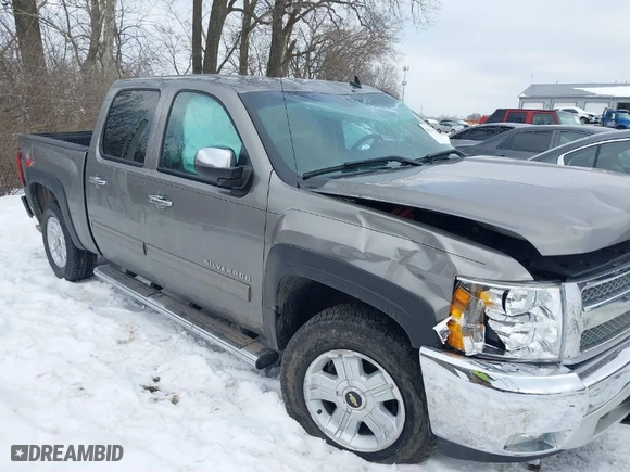 2012 Chevrolet Silverado 1500 LT with VIN 1GCPKSE71CF189169, listed as a IAAI auction lot 41337372 with 106,570 mi miles. Bid and sale history available at carsss.com. Image 1.