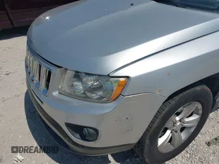 2012 Jeep Compass Sport with VIN 1C4NJCBA7CD660091, listed as a IAAI auction lot 42113038 with 123,181 mi miles. Bid and sale history available at carsss.com. Image 13.