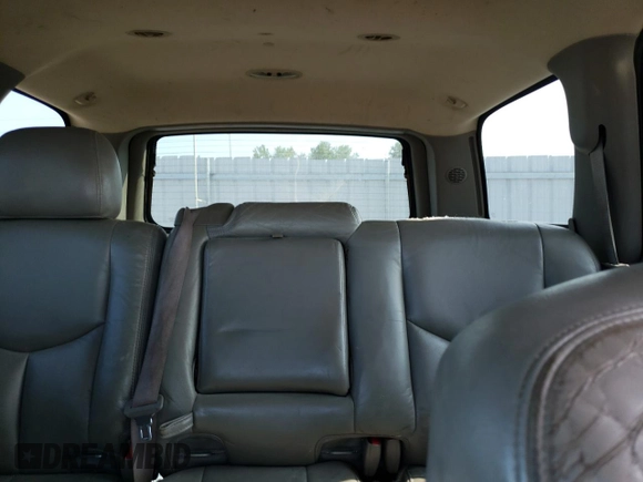 2003 GMC Yukon SLT z VIN 1GKEK13Z93J159795, wystawiony jako Copart lot #64915913 z przebiegiem 414 569 mil mil oraz Szkoda całkowita • Salvage title. Historia ofert i sprzedaży dostępna na DreamBid. Obrazek 10.