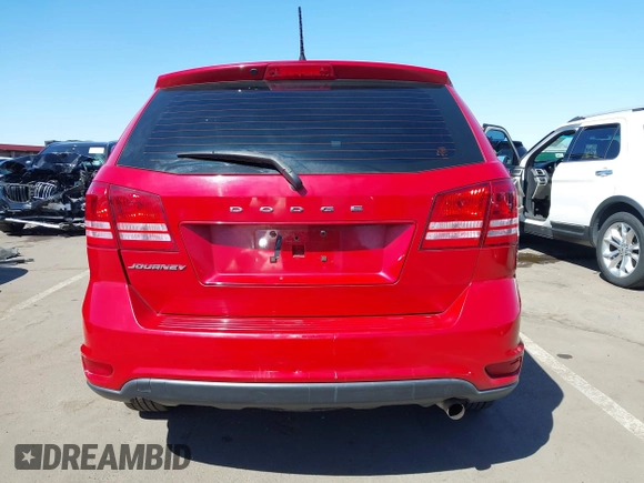 2015 Dodge Journey SE z VIN 3C4PDCAB9FT587668, wystawiony jako IAAI lot #41868556 z przebiegiem 99 695 mil mil oraz . Historia ofert i sprzedaży dostępna na DreamBid. Obrazek 16.