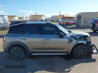 2019 MINI Countryman Cooper S with VIN WMZYT3C58K3E97323, listed as a IAAI auction lot 41490191 with 48,966 mi miles and . Bid and sale history available at DreamBid. Image 14.