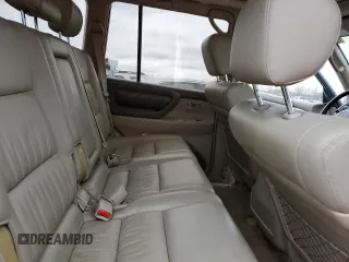 1999 Toyota Land Cruiser z VIN JT3HT05J6X0064313, wystawiony jako Copart lot #49555315 z przebiegiem 177 814 mil mil oraz Szkoda całkowita • Salvage title. Historia ofert i sprzedaży dostępna na DreamBid. Obrazek 11.