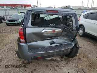 2006 Saturn VUE z VIN 5GZCZ63406S871660, wystawiony jako Copart lot #83851804 z przebiegiem 196 634 mil mil oraz Szkody całkowita. Historia ofert i sprzedaży dostępna na DreamBid. Obrazek 6.