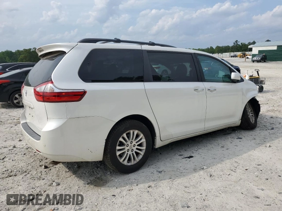 2016 Toyota Sienna XLE with VIN 5TDYK3DC3GS730639, listed as a Copart auction lot 57379935 with 105,323 mi miles and Salvage title. Bid and sale history available at DreamBid. Image 3.