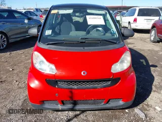 2008 Smart fortwo Pure z VIN WMEEJ31X28K122571, wystawiony jako IAAI lot #41680541 z przebiegiem 63 673 mil mil oraz . Historia ofert i sprzedaży dostępna na DreamBid. Obrazek 12.