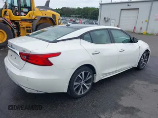 2016 Nissan Maxima Platinum with VIN 1N4AA6AP9GC403960, listed as a IAAI auction lot 42781654 with 19,699 mi miles and . Bid and sale history available at DreamBid. Image 4.