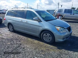 2007 Honda Odyssey EX with VIN 5FNRL38457B141956, listed as a IAAI auction lot 41818619 with 160,649 mi miles. Bid and sale history available at carsss.com. Image 1.