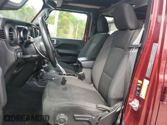 2021 Jeep Wrangler Unlimited Sport S with VIN 1C4HJXDGXMW785601, listed as a Copart auction lot 57342445 with 57,147 mi miles and Salvage title. Bid and sale history available at DreamBid. Image 7.