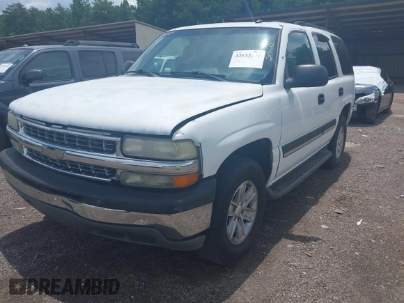 2005 Chevrolet Tahoe LS with VIN 1GNEC13V65R154250, listed as a IAAI auction lot 42633273 with 319,329 mi miles and . Bid and sale history available at DreamBid. Image 2.