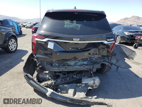 2020 Cadillac XT6 FWD Premium Luxury z VIN 1GYKPCRS9LZ126510, wystawiony jako Copart lot #58240585 z przebiegiem 57 156 mil mil oraz Szkoda całkowita • Salvage title. Historia ofert i sprzedaży dostępna na DreamBid. Obrazek 6.