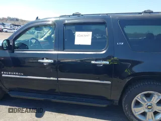 2009 Chevrolet Suburban LTZ with VIN 1GNFK36399J124158, listed as a IAAI auction lot 42063097 with 204,856 mi miles. Bid and sale history available at carsss.com. Image 14.