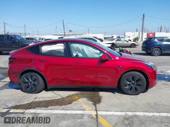 2024 Tesla Model Y Long Range with VIN 7SAYGDEE6RF190947, listed as a IAAI auction lot 41808973 with 2,457 mi miles. Bid and sale history available at carsss.com. Image 13.