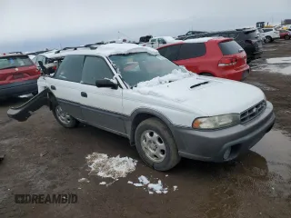1997 Subaru Legacy Outback with VIN 4S3BG6858V6646771, listed as a Copart auction lot 79514484 with 216,013 mi miles and Non repairable. Bid and sale history available at DreamBid. Image 4.